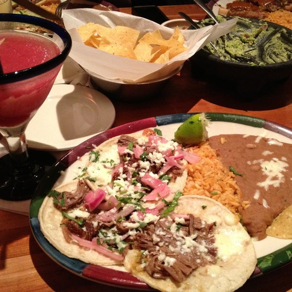 Margaritas are strong but excellent, tacos de barbacoa are fantastic-juicy and barbacoa-d to perfection with pickled onions and cheese. Tortillas a little soggy, rice and beans inedible. Recommended!