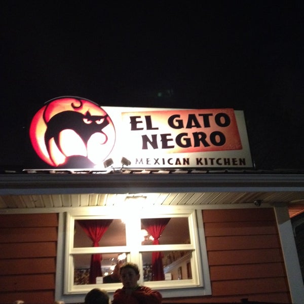 Photo taken at El Gato Negro by Christina G. on 2/2/2014