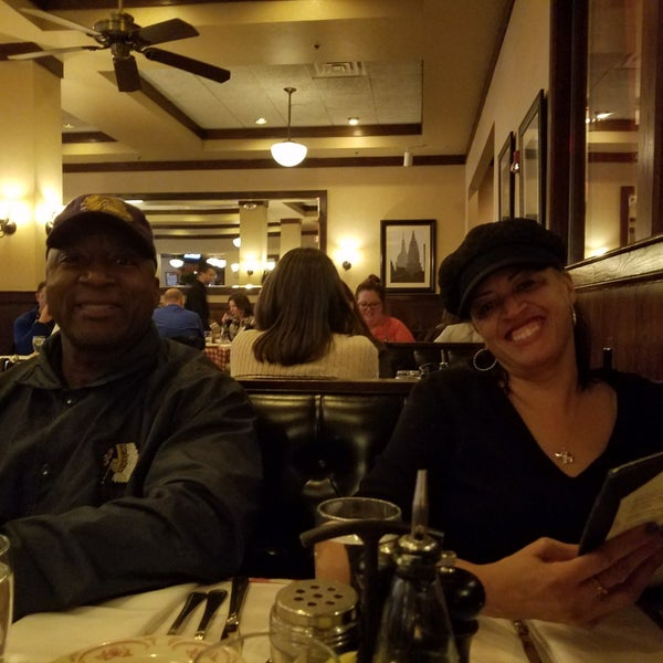 Photo taken at Maggiano&#39;s Little Italy by Mitra E. on 3/26/2018