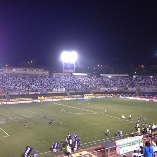 Photo taken at Estadio Cementos Progreso by Miguel E. on 12/18/2012