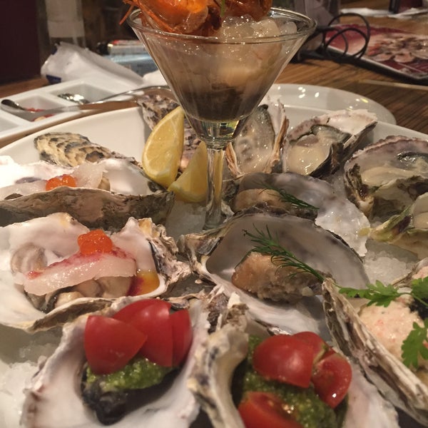 Photo taken at Oyster Table by Takashi F. on 12/12/2014
