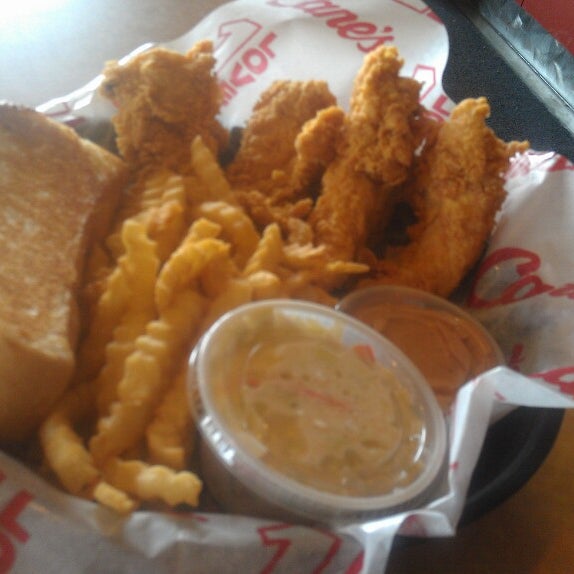 Photo taken at Raising Cane&#39;s Chicken Fingers by Eric G. on 5/6/2013