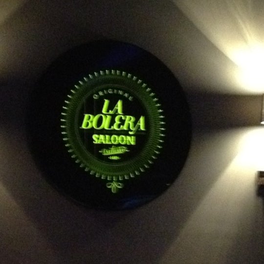Photo taken at La Bolera Saloon by Carolina V. on 2/17/2012