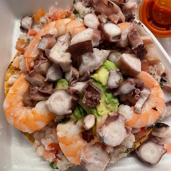 Photo taken at Mariscos 4 Vientos Taco Truck by John C. on 2/1/2021