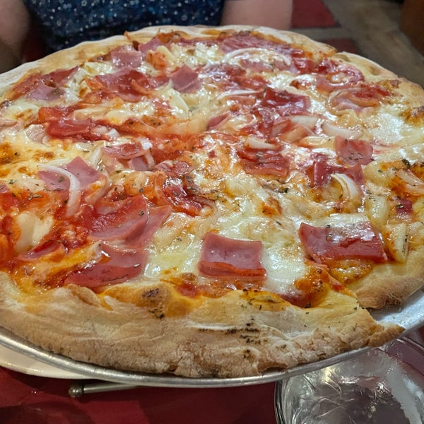 Photo taken at John&#39;s Pizzeria by Joel S. on 6/24/2022