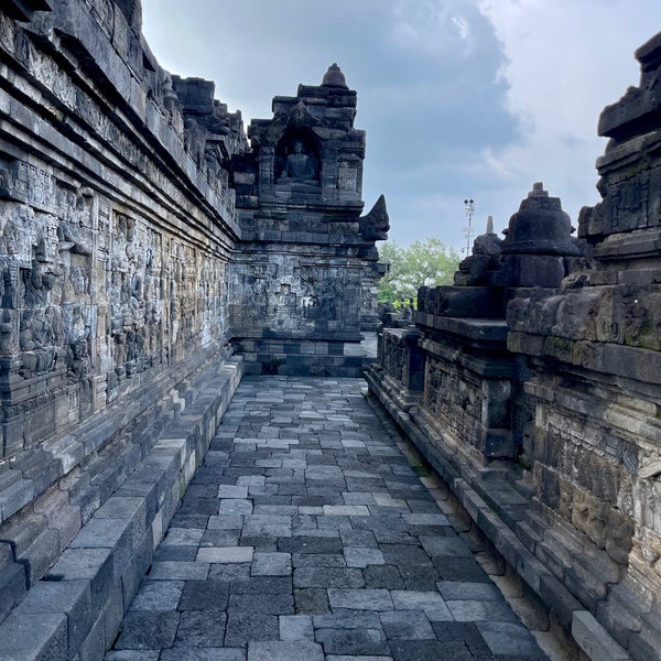 Constructed of gray andesite-like stone, the temple consists of nine such stacked platforms (6 square and 3 circular), topped by an iconic central dome. Source: Wikipedia