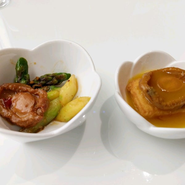 Left: stir-fried abalone with XO sauce. Right: braised abalone with tofu