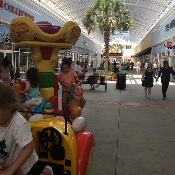Photo taken at Tanger Outlets Charleston by Esen on 6/16/2018