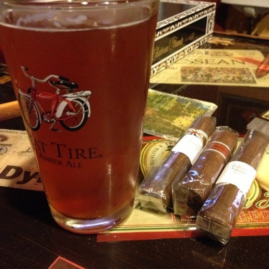 Photo taken at Crown Cigars and Ales by Daniel S. on 12/9/2012