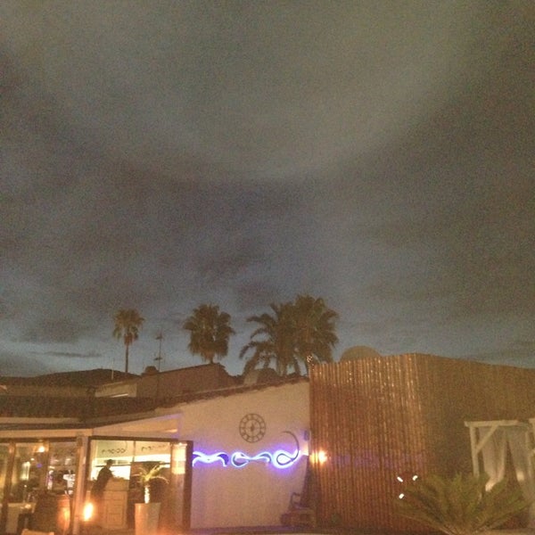 Photo taken at Mood Beach &amp; Restaurant by Simon V. on 8/12/2013