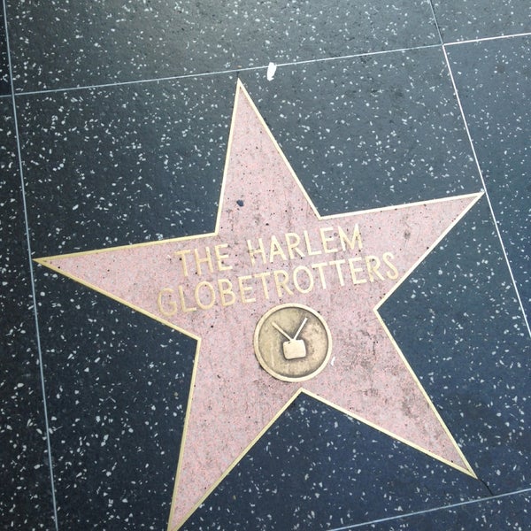Photo taken at Hollywood Walk of Fame by Caitlin C. on 5/26/2013