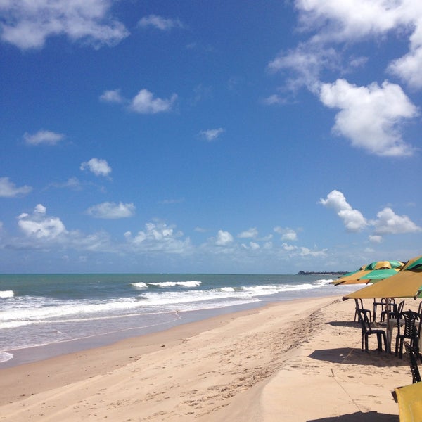 Photo taken at Praia Barra de Gramame by Conceicao A. on 12/5/2014