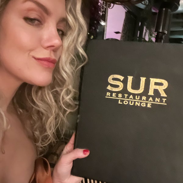 Photo taken at Sur Restaurant and Bar by Kat S. on 12/19/2022