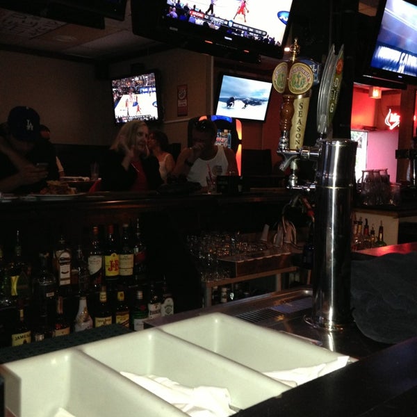 Photo taken at Grunions Sports Bar &amp; Grill by Rudy H. on 3/29/2013