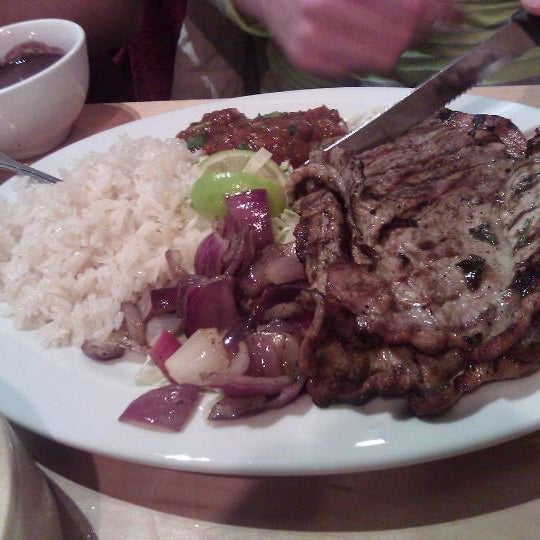 Photo taken at Poc-Chuc Restaurant by Leo P. on 3/17/2013