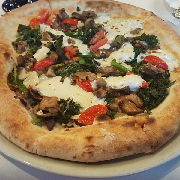Photo taken at Amalfi Pizza by Kate F. on 4/19/2018
