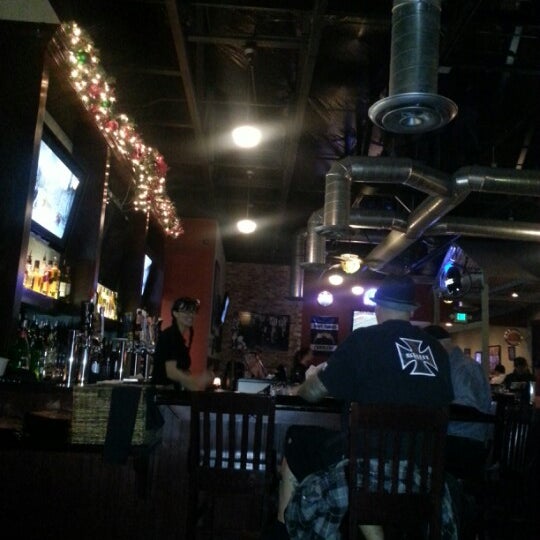 Photo taken at J. Carter&#39;s Tavern Grill by Mike G. on 12/27/2012