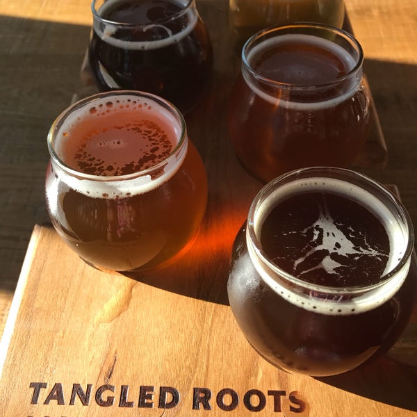 Photo taken at The Lone Buffalo by Tangled Roots Brewing Company by Kim R. on 7/8/2017