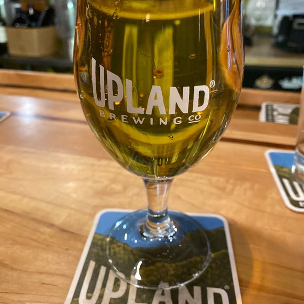 Photo taken at Upland Brewing Company Brew Pub by Kim R. on 2/8/2022