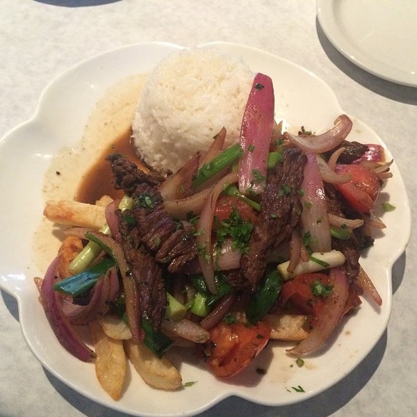 Photo taken at Lola&#39;s Peruvian Restaurant by Sait Mesutcan I. on 9/5/2014