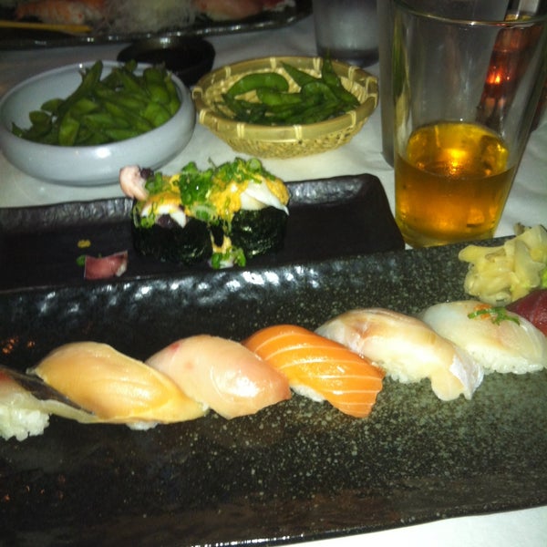 Photo taken at Umami Restaurant and Sushi Bar by Jeronimo S. on 12/7/2014