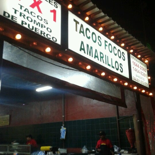 Photo taken at Tacos Focos Amarillos by Pao d. on 12/8/2012