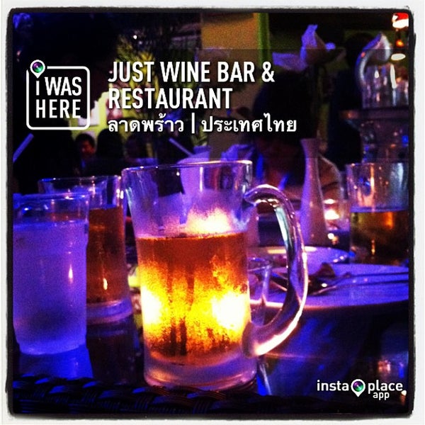 Photo taken at Just Wine Bar &amp; Restaurant by Saran Y. on 5/10/2013