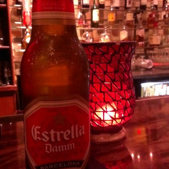 Photo taken at Malaga Tapas &amp; Bar by David P. on 2/28/2014