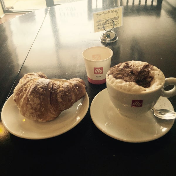 Authentic Italian cappuccino with filled croissant