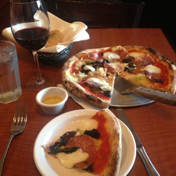 Photo taken at Vesta Wood Fired Pizza &amp; Bar by Fed on 6/16/2013