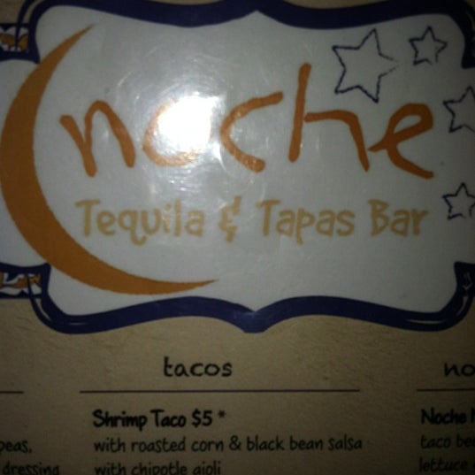 Photo taken at Noche Tequila &amp; Tapas Bar by Jennifer S. on 12/8/2012