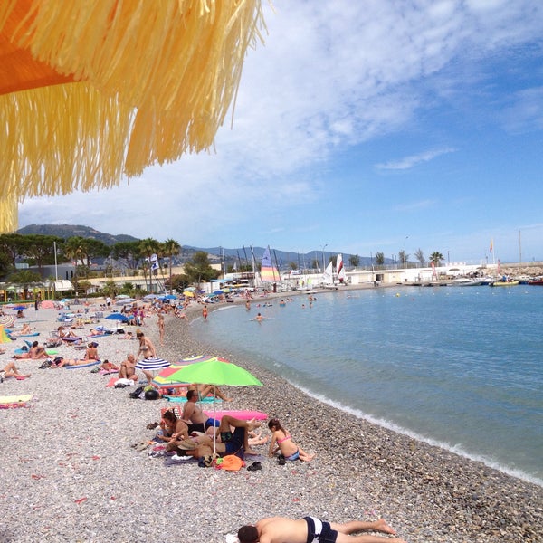 Photo taken at Plage de Roquebrune Cap Martin by Sedat Y. on 7/14/2016
