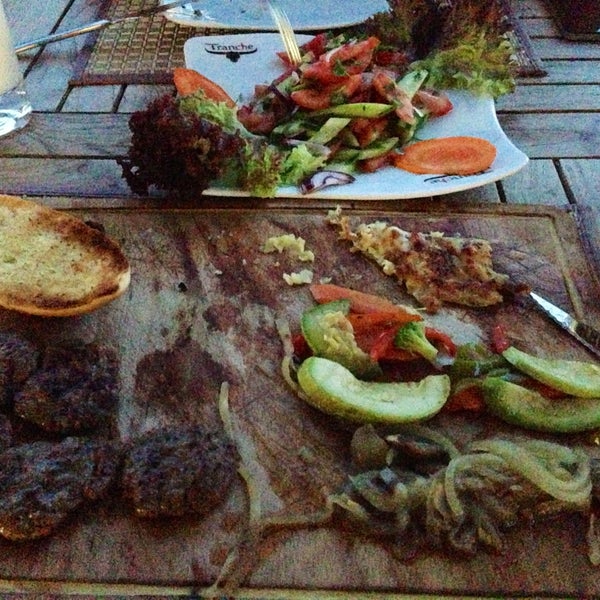 Photo taken at Tranche Steak House by Fatoş K. on 5/6/2013