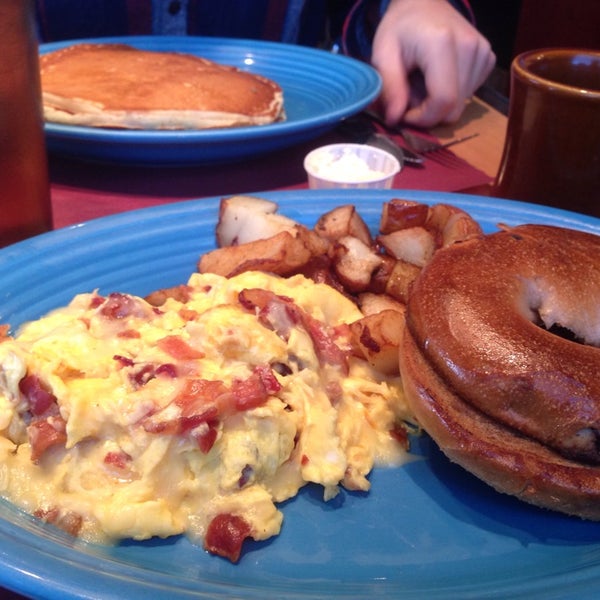 Skip the toast and upgrade to a grilled bagel. The applewood bacon and cheddar cheese scramble was delicious. Pancakes (lemon ricotta) are flavorful and fluffy!