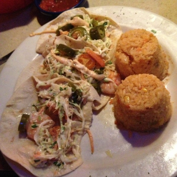 Photo taken at La Parrilla Mexican Restaurant by Monica K. on 12/31/2012