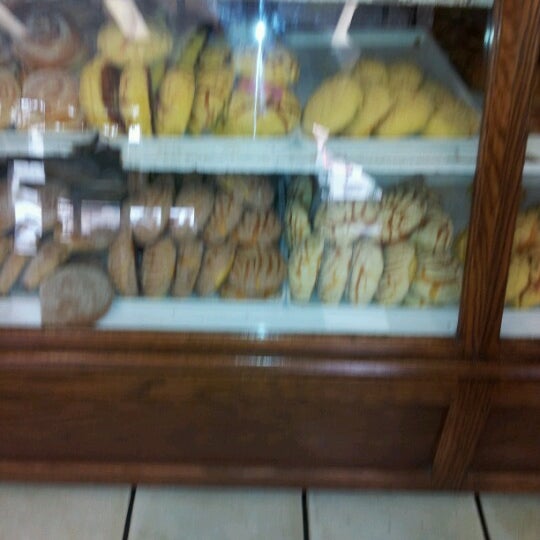 Photo taken at El Gallo Bakery by Laura G. on 10/20/2012