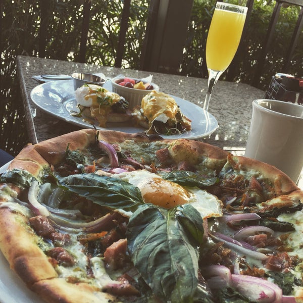 Delicious brunch. Brunch pizza is a good one for you hungry happy people.