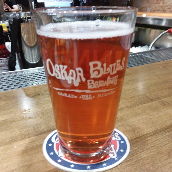 Photo taken at Oskar Blues Grill and Brew by Jim M. on 3/31/2019