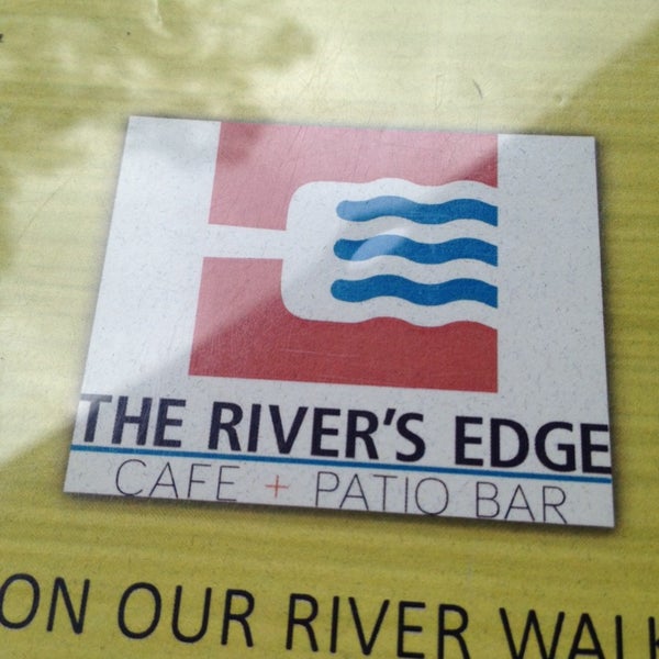Photo taken at The River&#39;s Edge Cafe + Patio Bar by Robin W. on 4/13/2014