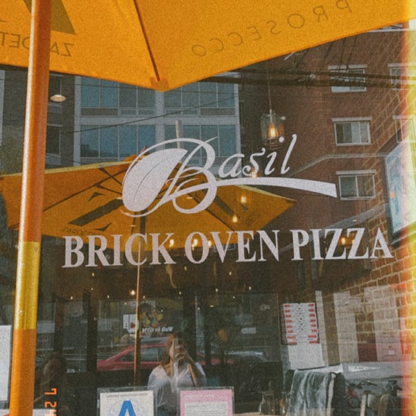 Photo taken at Basil Brick Oven Pizza by Kisarne B. on 7/24/2021