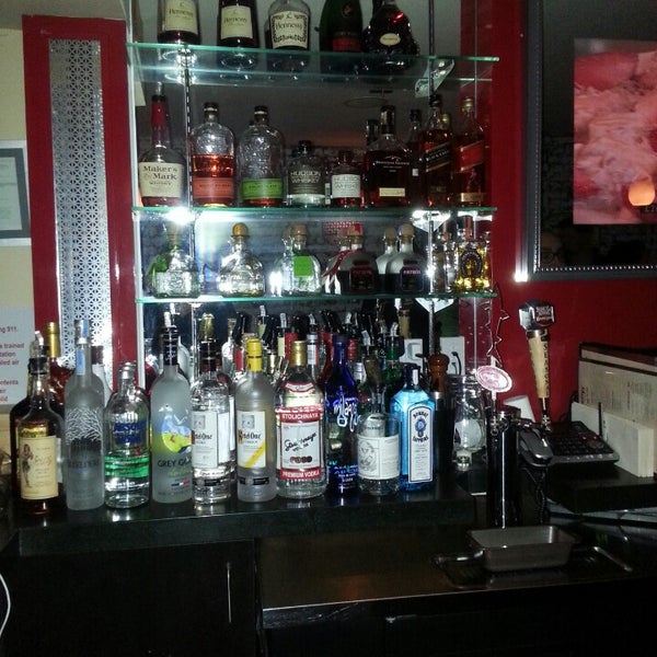 Photo taken at Bar Rique by Steven T. on 2/7/2014