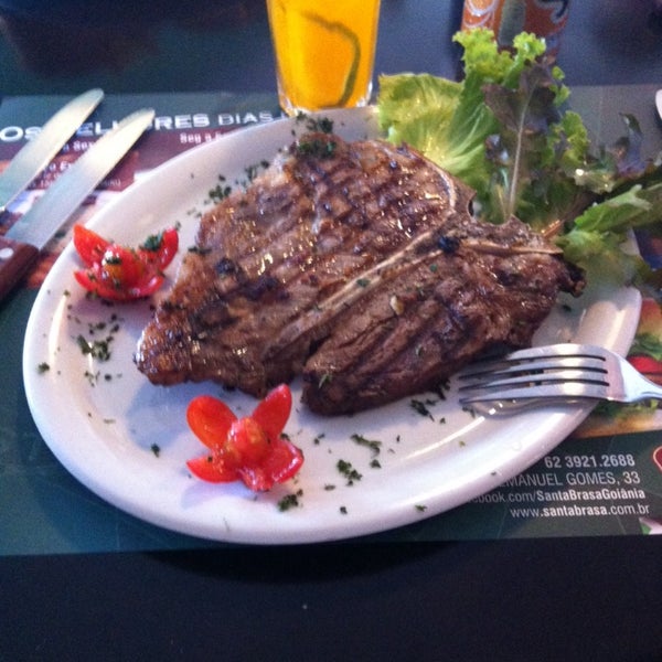 Photo taken at Santa Brasa Authentic Steaks by Maykol L. on 5/22/2014