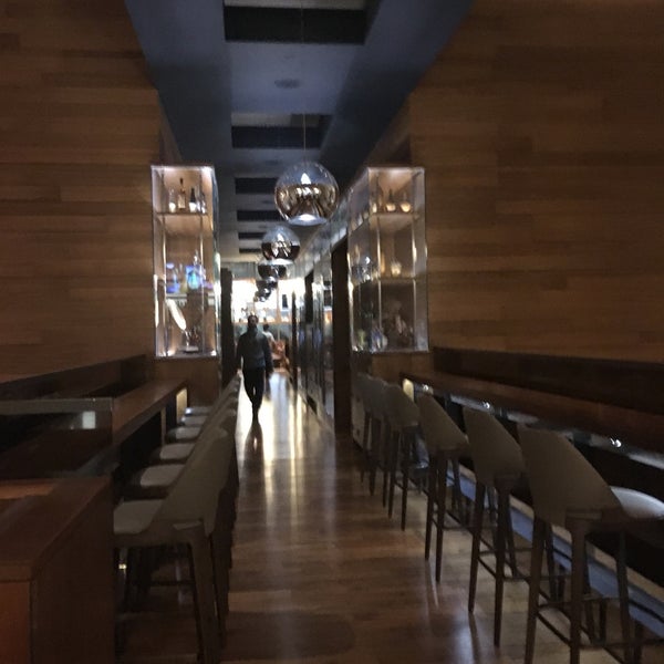 Photo taken at OneUP Restaurant &amp; Lounge by Albert C. on 3/2/2019
