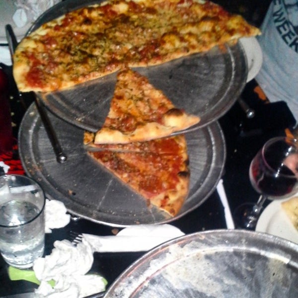 Photo taken at Salvation Pizza - 34th Street by Ryan C. on 7/19/2014
