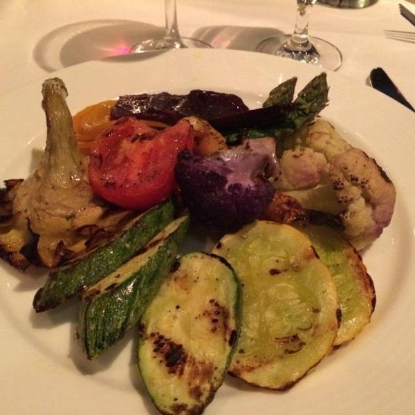 Very corporate/baby boomer crowd. Kitchen is really accommodating-they prepared an entire off-the-menu platter of grilled veggies. Have (at least) a bite of their chocolate lava cake. Amazing florals
