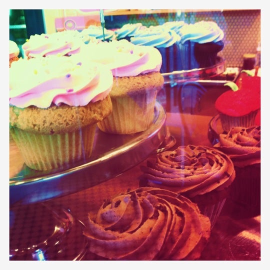 Photo taken at Cupcakes on Denman by Tricia A. on 10/8/2012