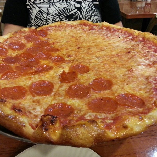 Photo taken at Bross Pizza by rebecca p. on 11/1/2013
