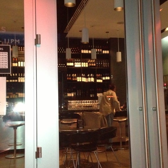 Foto diambil di The Tasting Room Wine Bar &amp; Shop oleh Aaron F. pada 10/21/2012