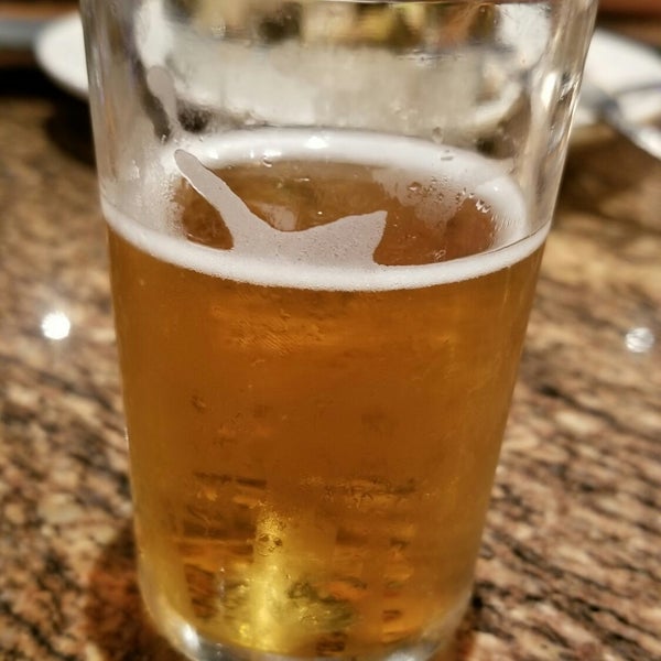Photo taken at BJ&#39;s Restaurant &amp; Brewhouse by Juan R. on 6/23/2018