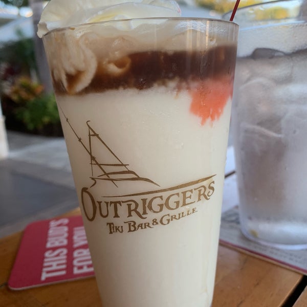 Photo taken at Outriggers Tiki Bar and Grille by Renee D. on 1/3/2020